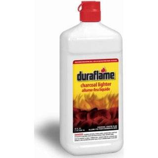 COWBOY CHARCOAL LLC QT Duraflame Lighter Fluid Product Is Poured Onto