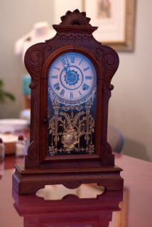 Antique Gingerbread Pendulum Mantel Clock