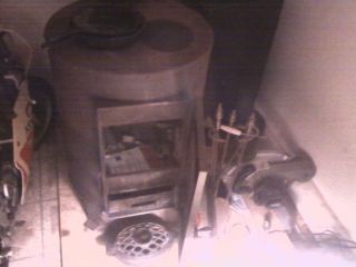 Shenandoah Wood Coal Burning Stove with Exaust Pipes and Roof and Wall Flanges
