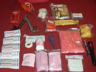 Surplus Emergency First Aid Survival Kit Flashlight Multi Tool Backpack Military