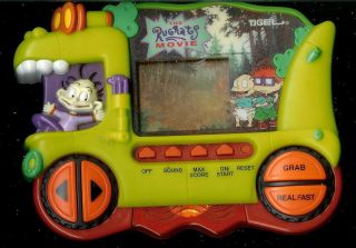 1990s The Rugrats Movie Tiger Electronic Handheld Toy Game Chuckie Tommy Reptar