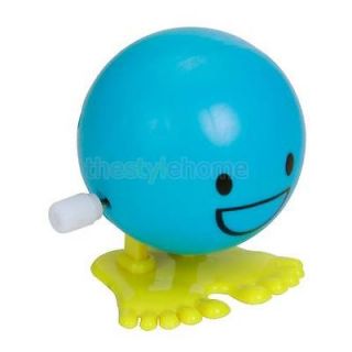 Wind Up Toy Clockwork Jump Jumping Face Smile Teeth Kids Party Favour Fun Gift